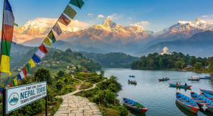 A bustling street in Thamel, Kathmandu, featuring colorful prayer flags, trekking gear shops, and tourists walking through narrow alleys.